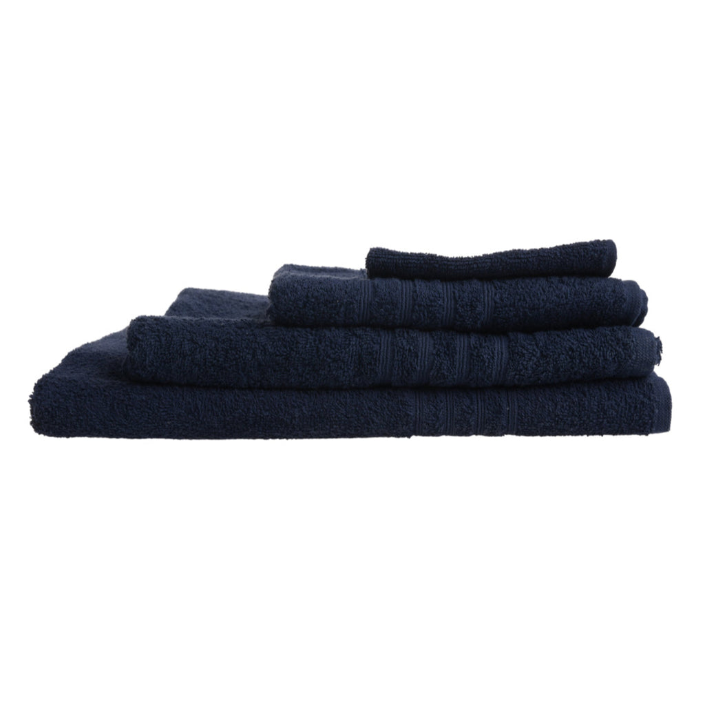Stack of navy blue towels on a white background