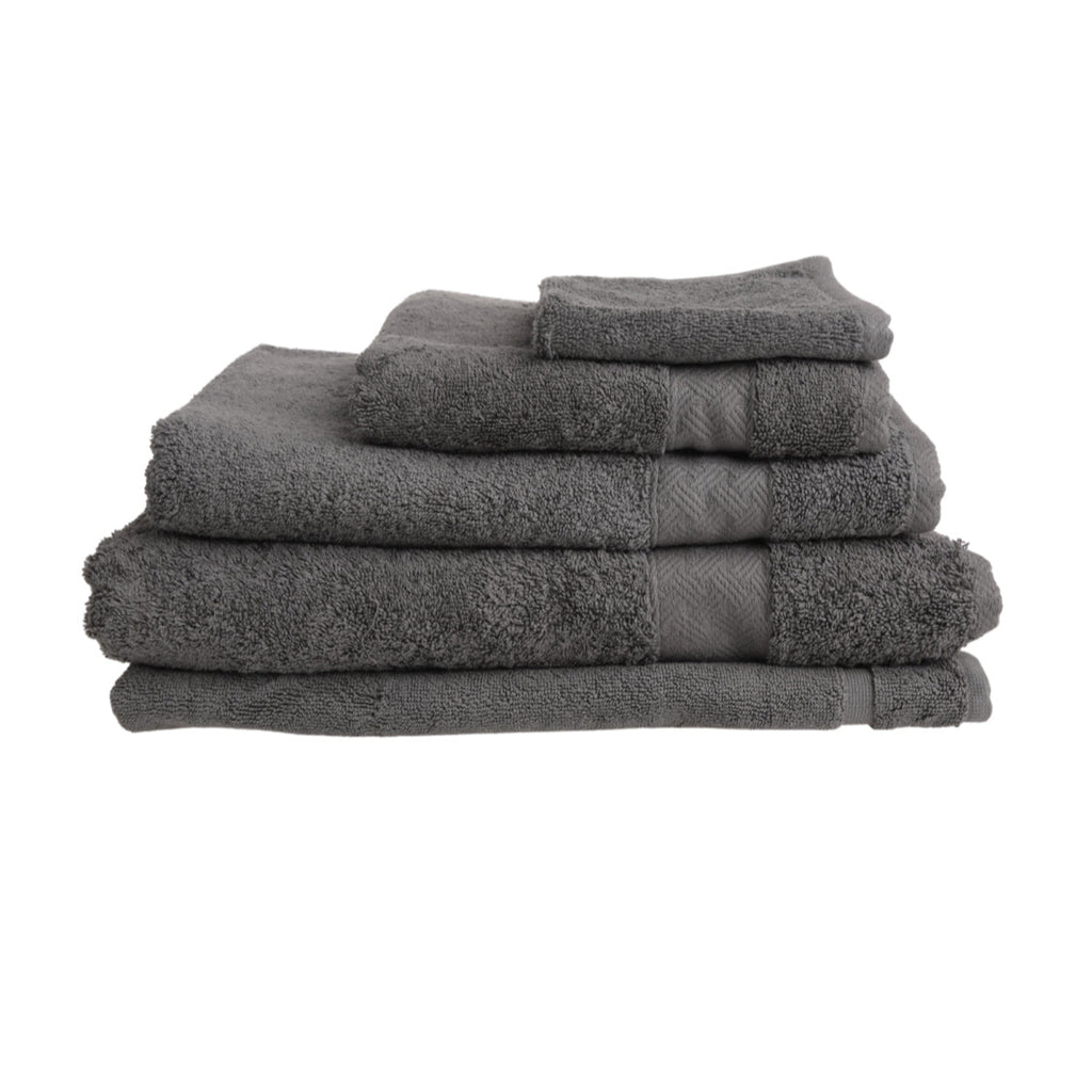 Stack of gray towels on a white background